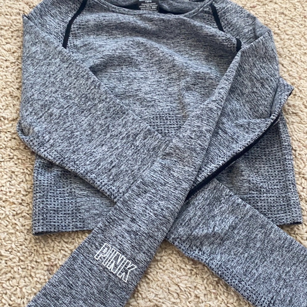 grey pink shirt